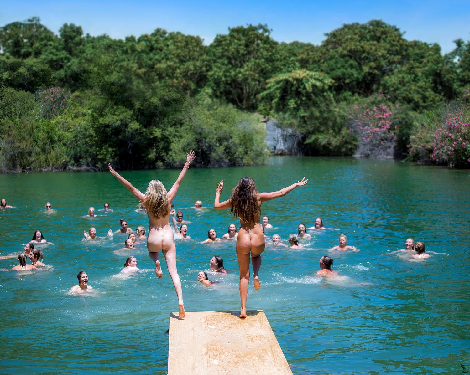 Naked women at lake
